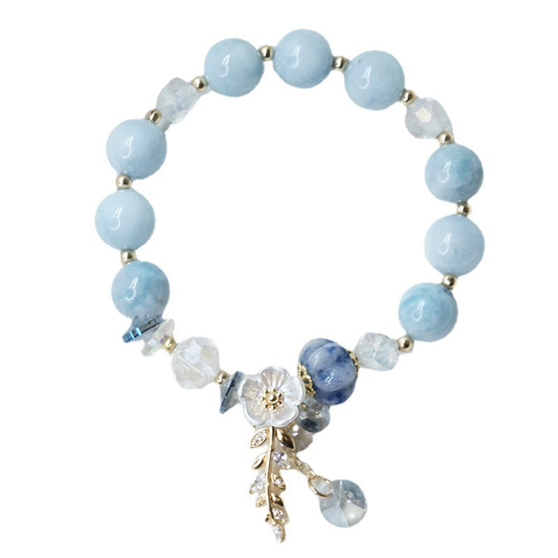 Armband mit Kristallanhänger in Bonbonfarben aus Stein mit Blumenblatt