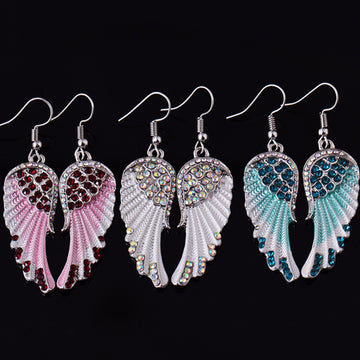 Elegant Handcrafted Natural Crystal Angel Earrings by Tinkers