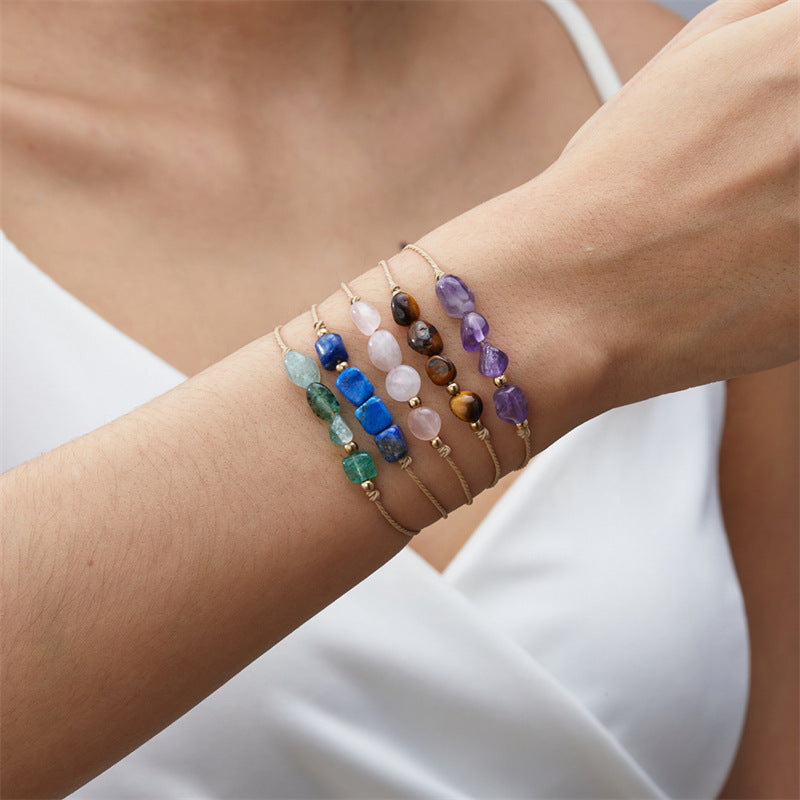 Aries raw crystal zodiac bracelet on kraft meaning card