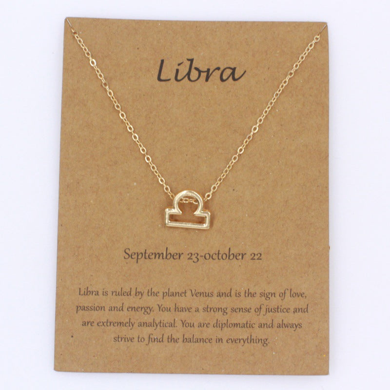 Libra gold zodiac pendant necklace on meaning card