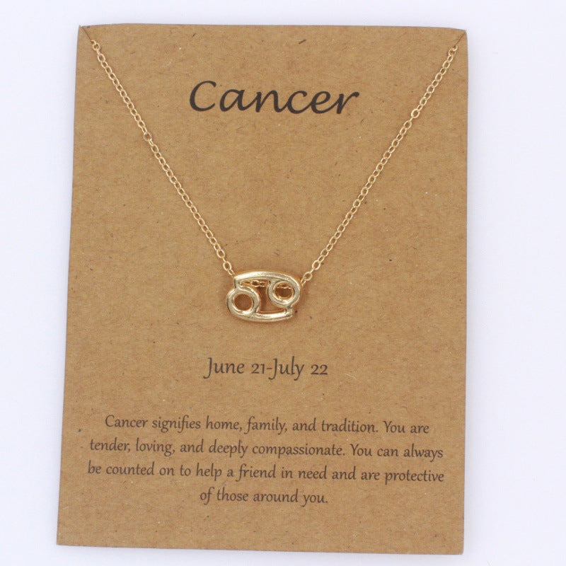 Aries gold zodiac pendant necklace on meaning card