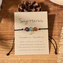 Sagittarius dainty zodiac charm bracelet on kraft card