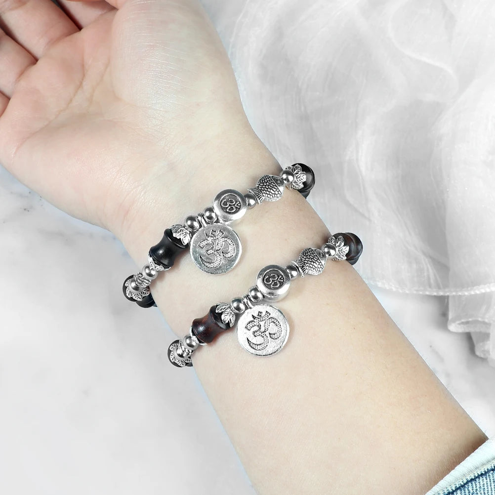 Bambusperlen-OM-Armband von Tinkers – Spirituelles Gleichgewicht